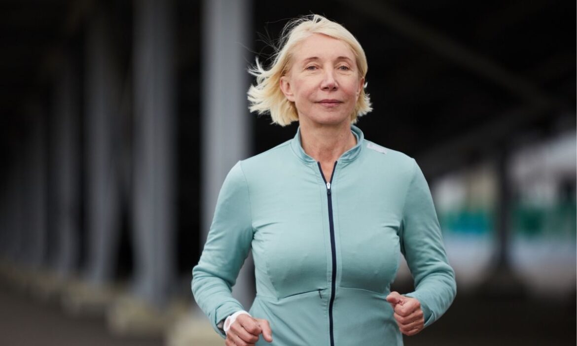 Older woman jogging image by canva