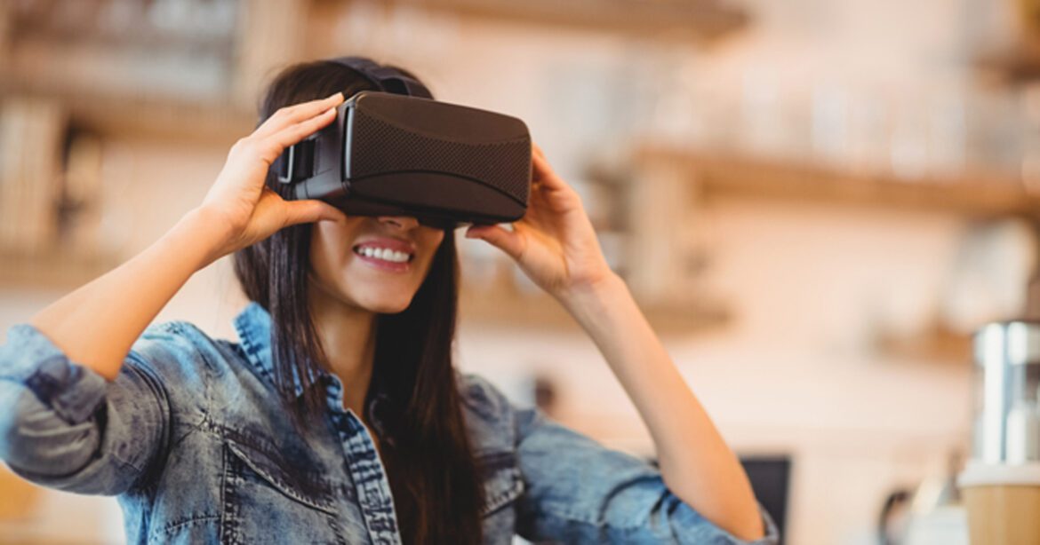 Young woman using the virtual reality headset