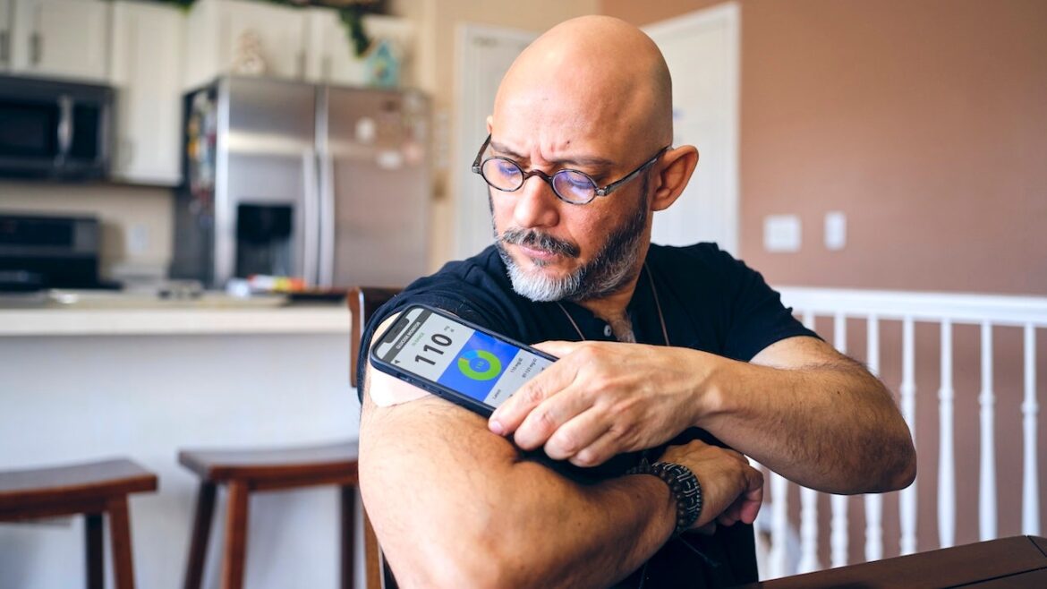 Man checking blood sugar